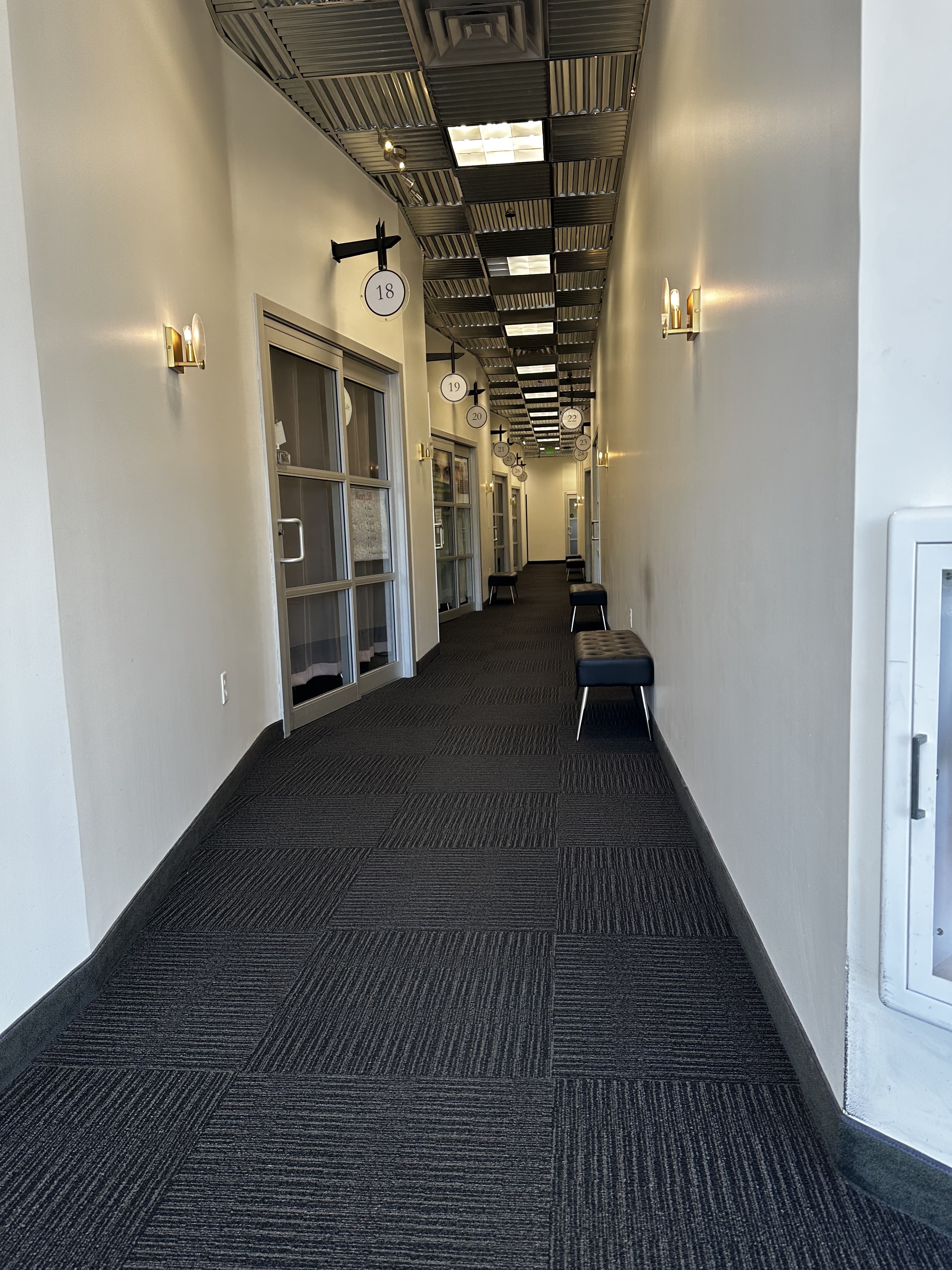 Welcoming hallway inside Kao Thai Massage studio at Sola Salon Studios, Cupertino